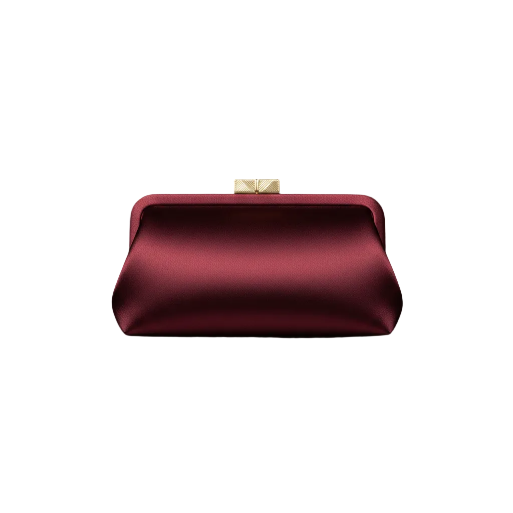 Veloura Burgundy Clutch flat lay on velvet